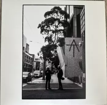 AT