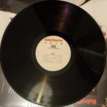 LP Baby Charles: Baby Charles LTD