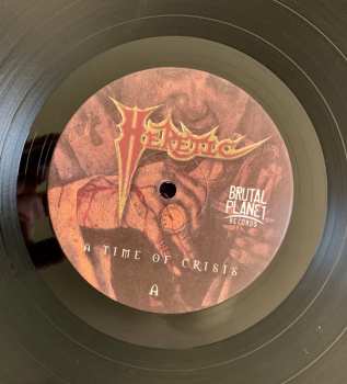 LP Heretic: A Time of Crisis