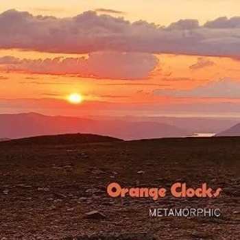 CD Orange Clocks: Metamorphic