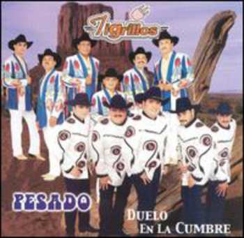 Album Pesado: Duelo En La Cumbre