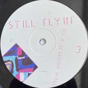 LP Still Flyin': On A Bedroom Wall